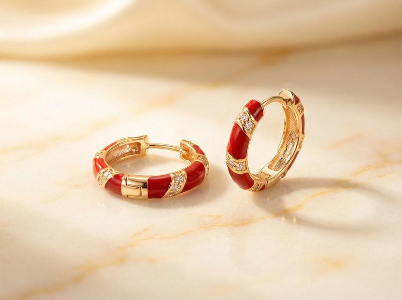 Créoles à rayures émaillées or et rouge avec cristaux