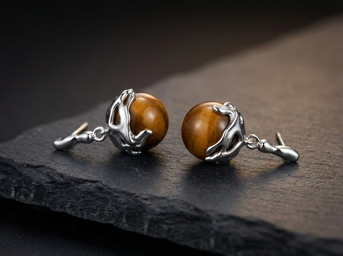 Boucles d'oreilles pendantes griffe œil de tigre argenté
